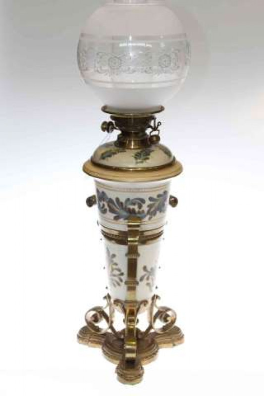 High quality brass and pottery oil lamp, the painted vase body with substantial gilt brass strap amount and base, 50cm to burner