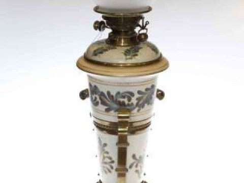 High quality brass and pottery oil lamp, the painted vase body with substantial...