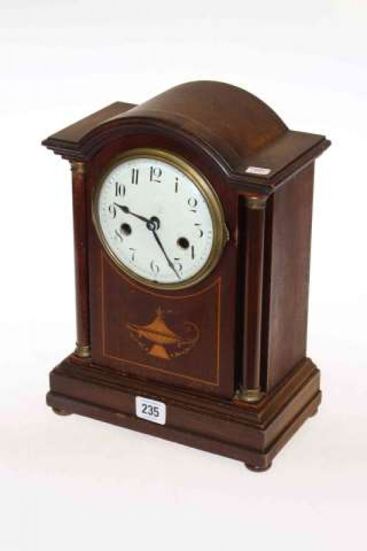 Inlaid mahogany striking mantel clock
