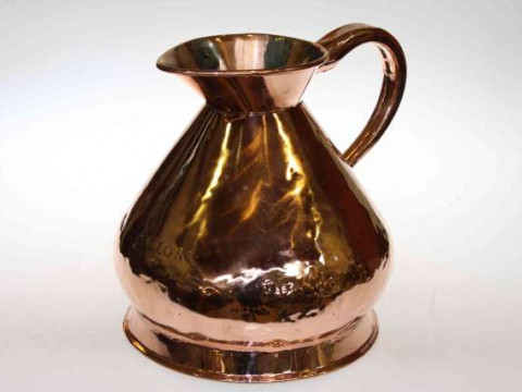 Copper measuring jug in antique style