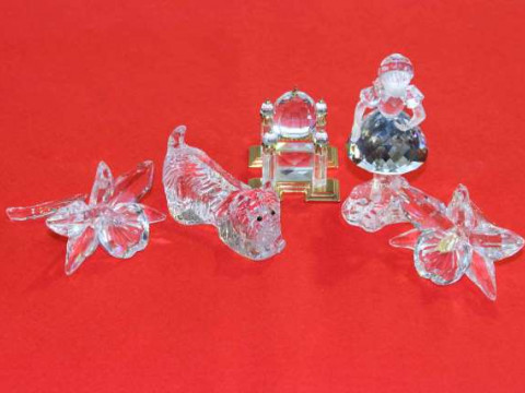 Four boxed Swarovski models, Dog, Riding Hood, Orchid and Rose and Journeys