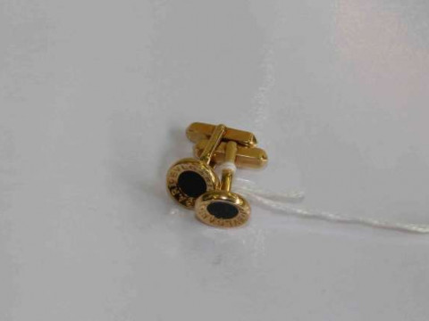 Pair of Bulgari gold and onyx cufflinks