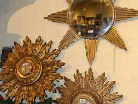 Two sunburst electric wall clocks and sunburst wall mirror (3)