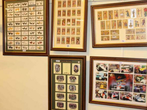 Twelve framed sets of cigarette and other cards