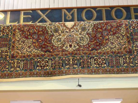 Traditional carpet with a fawn ground. 3.60m x 2.75m