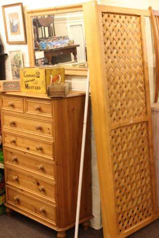 Pine seven drawer chest, pine framed wall mirror and latticed radiator cover