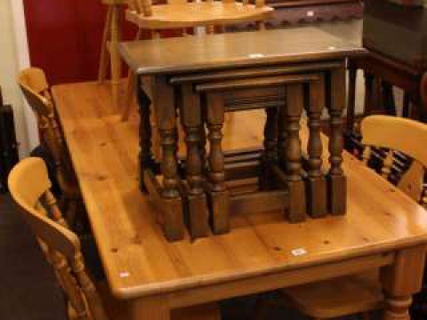 Rectangular pine turned leg kitchen table and six beech chairs (4 single...