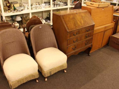 Mahogany three drawer bureau, teak bureau and two Lloyd Loom bedroom chairs