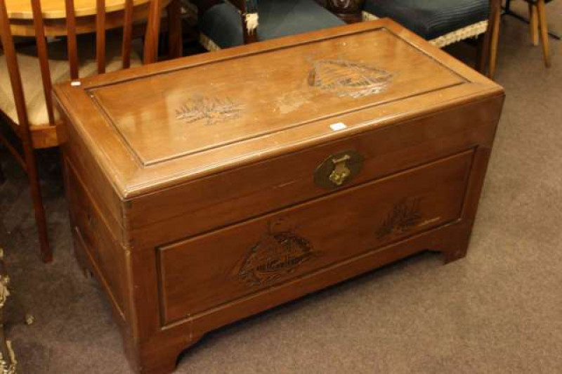 Carved Oriental camphorwood trunk