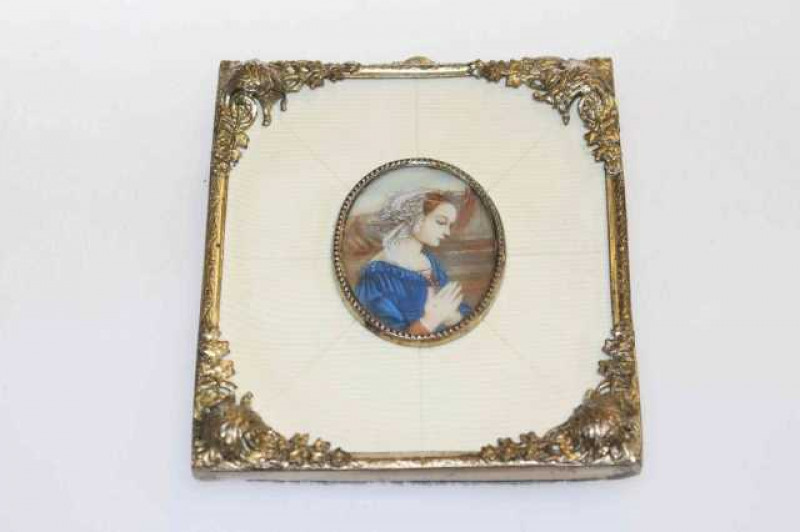 Ornate framed oval portrait miniature