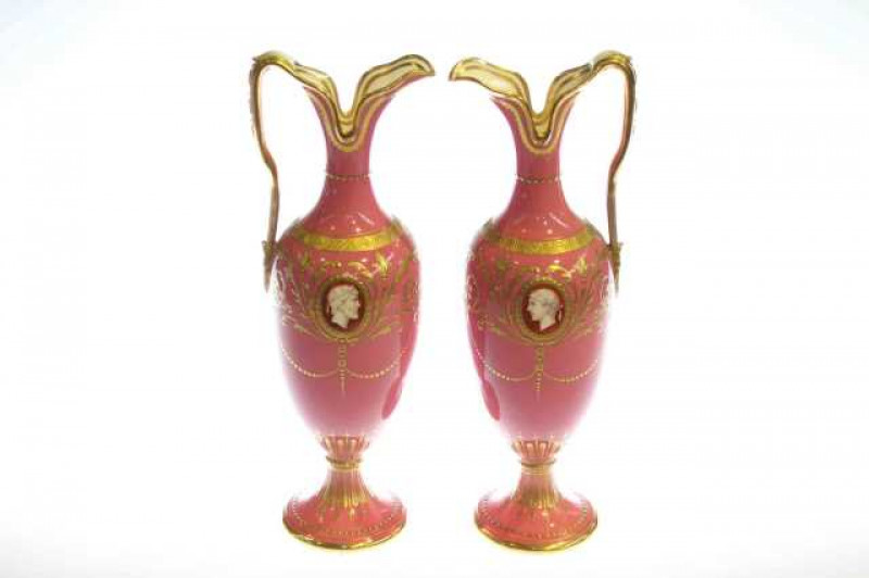 Pair of Minton ewers, having classical portrait cameos on gilt decorated pink ground