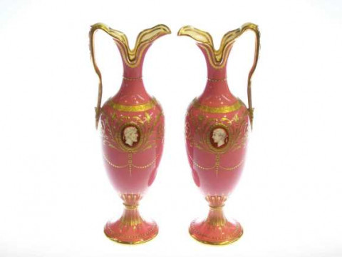 Pair of Minton ewers, having classical portrait cameos on gilt decorated...