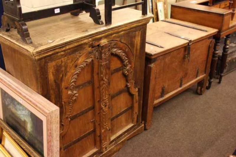 Arched double door hardwood cupboard and hardwood trunk with iron strap hinges