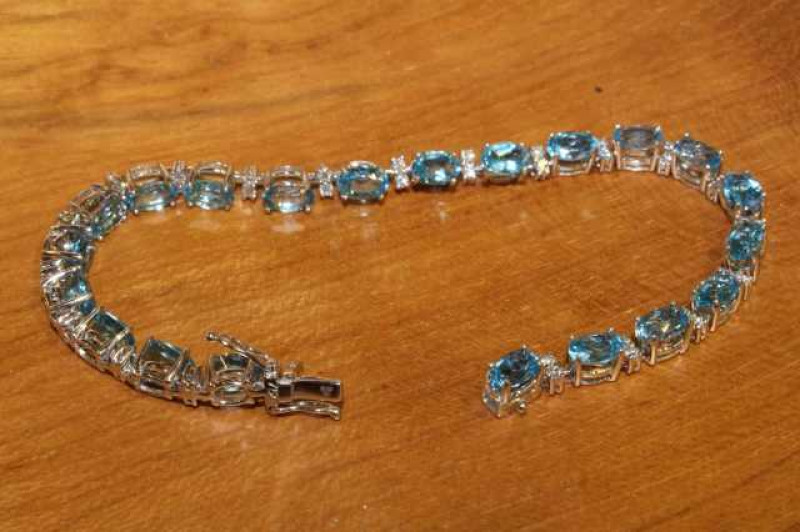 18 carat gold, blue topaz and diamond bracelet