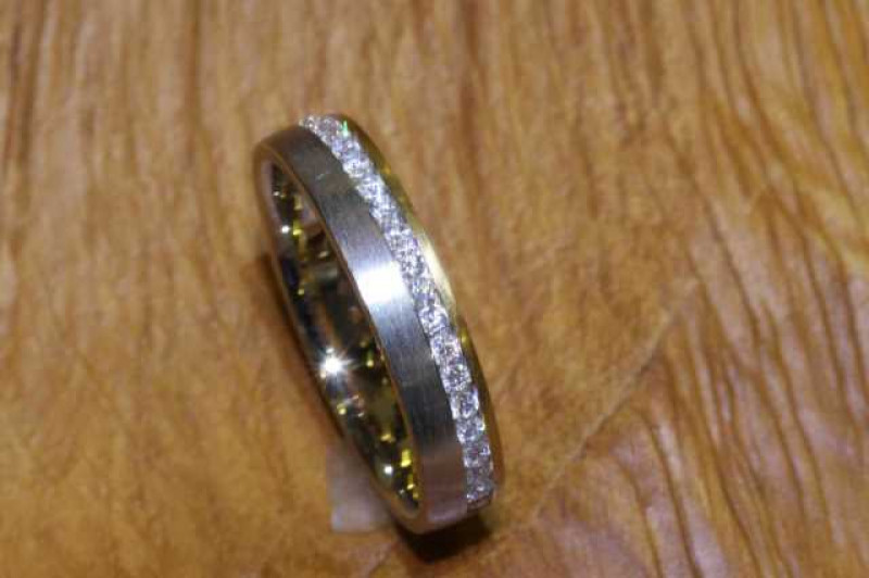 Two-tone 18 carat gold and diamond eternity ring, size M