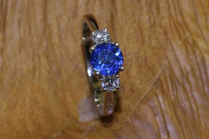 18 carat gold, round-cut sapphire and diamond ring, size M
