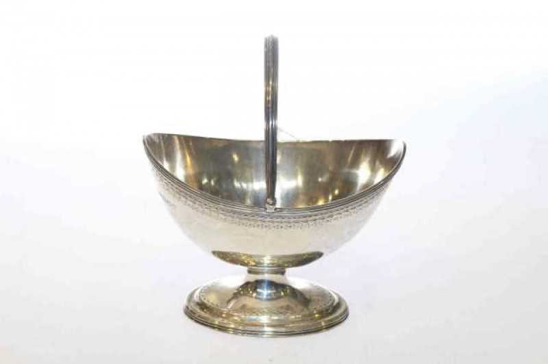 Silver swing-handled sugar basket with bright-cut engraving, London 1912, 5.5oz