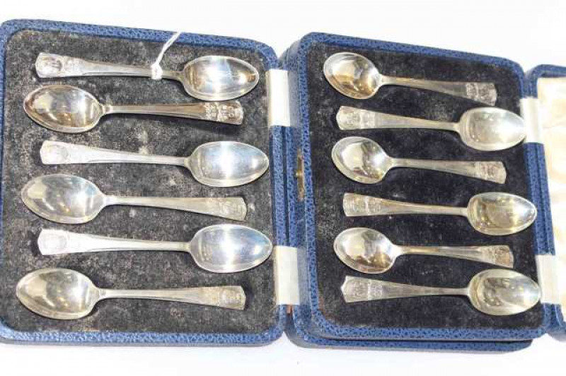 Two cased sets of six silver Coronation teaspoons