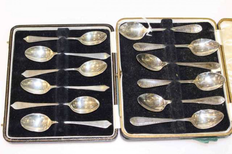 Two cased sets of six silver teaspoons