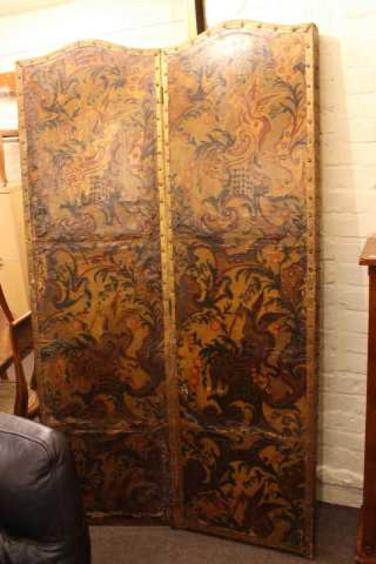 Four fold vanity screen with decorated studded hide panels and Antique Persian design rug (2)