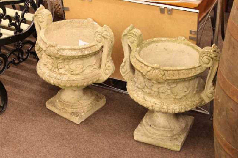 Pair weathered two-handled garden planters on pedestal bases