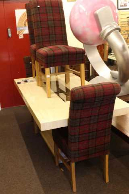 Contemporary faux marble topped dining table and four plaid chairs