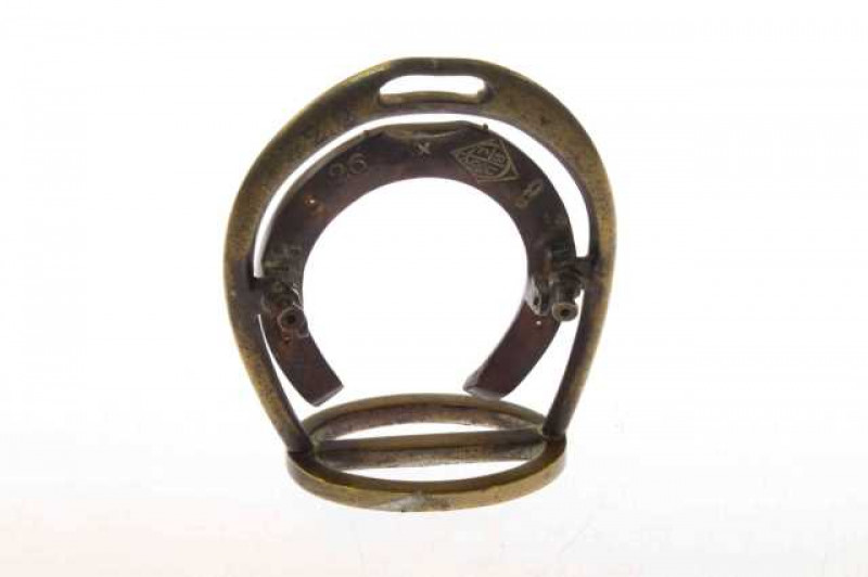 Brass horseshoe desk piece, inscribed BUCC