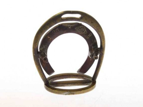 Brass horseshoe desk piece, inscribed BUCC