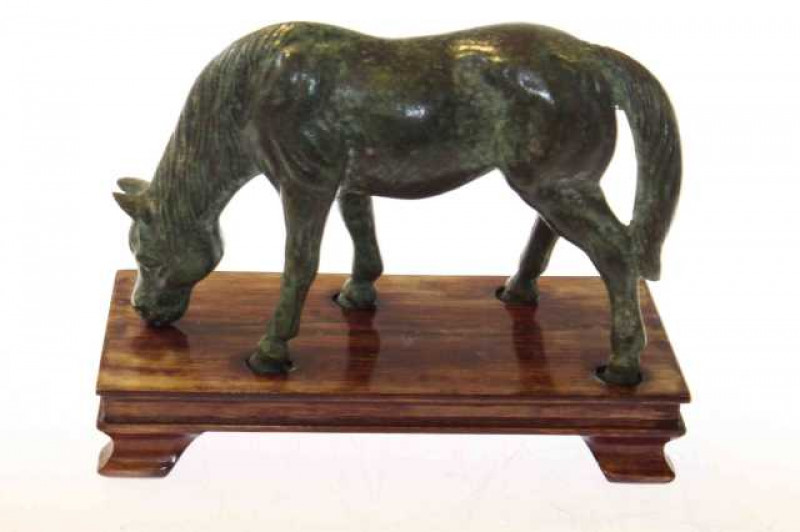 Bronze horse, on a hardwood plinth