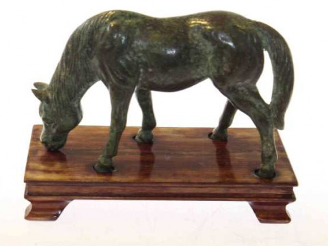 Bronze horse, on a hardwood plinth