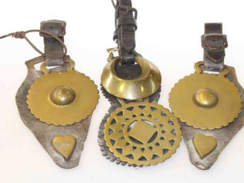 Three leathers of horse brasses