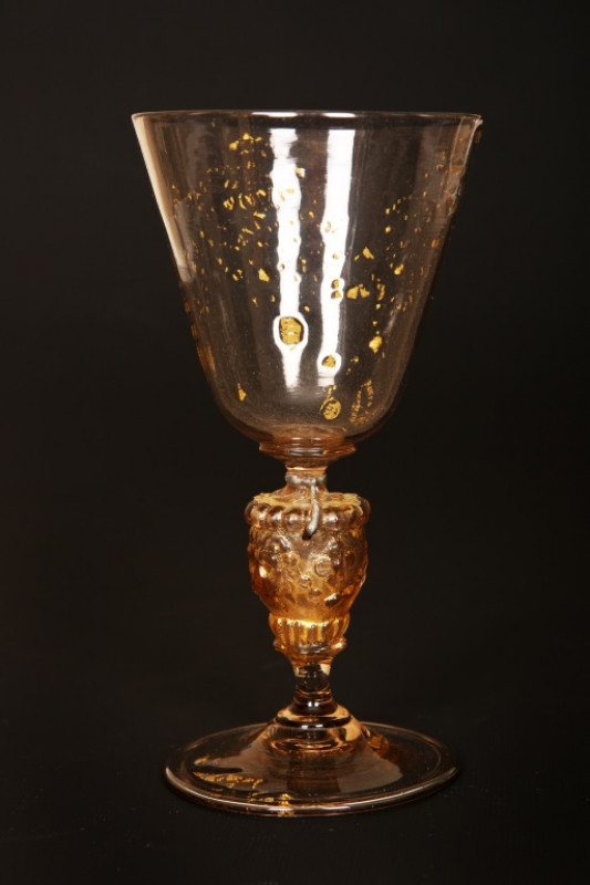 A CONTINENTAL CORDIAL GLASS, late 18th Century, with cotton twist stem and domed circular foot; together with a facon de venise wine glass, the knopped stem moulded with masks and flowerheads and with aventurine inclusions; and a small 18th Century spirit
