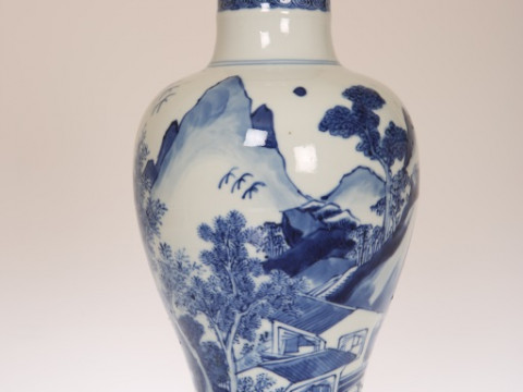 A CHINESE BLUE AND WHITE BALUSTER VASE, painted in the round with figures...