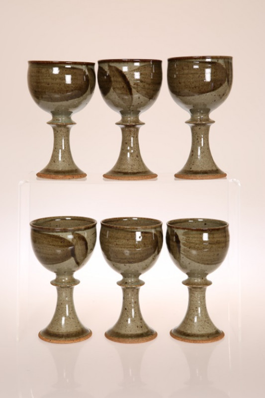 DAVID LLOYD JONES (1928-1994) A SET OF SIX STONEWARE GOBLETS, with Tenmoku glaze, seal marks. 16cm
