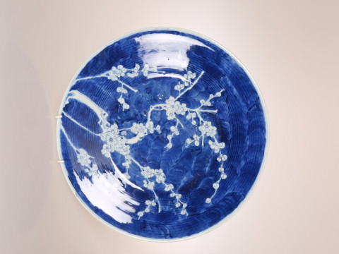 A CHINESE BLUE AND WHITE PORCELAIN CHARGER, possibly late 19th Century,...