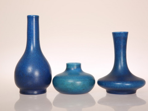 A GROUP OF THREE PILKINGTONS ROYAL LANCASTRIAN MATT BLUE LUSTRE VASES,...