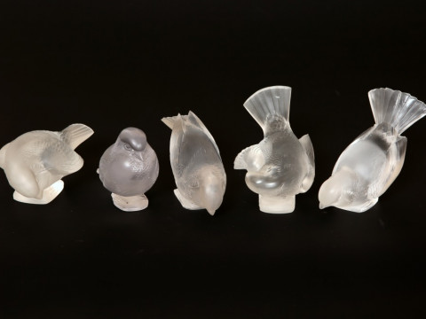 A SET OF FIVE LALIQUE 'MOINEAU' PAPERWEIGHTS, each sparrow modelled in...