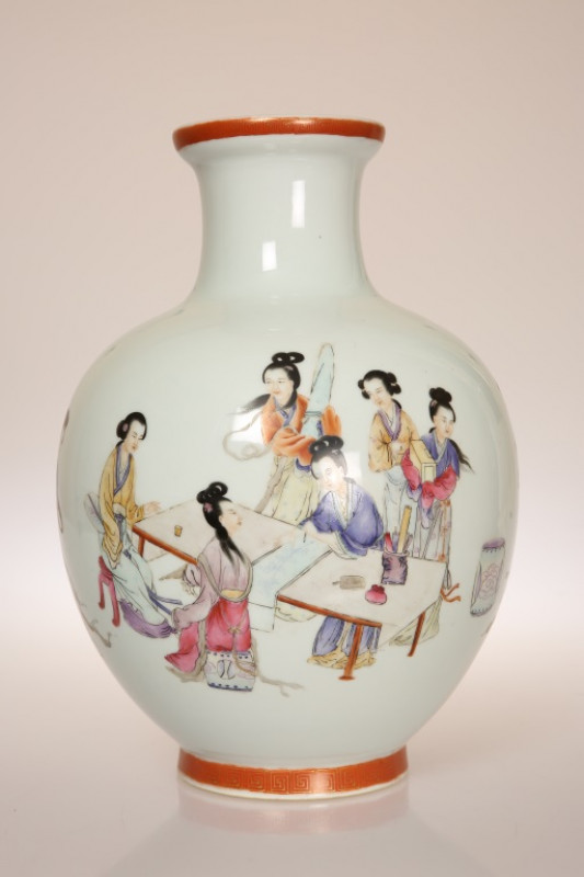 A CHINESE PORCELAIN VASE, possibly Republic period, of baluster form, painted with ladies at work at a table, the neck and foot rim with a band of iron red and gilt Greek Key, red seal mark to the base. 30cm