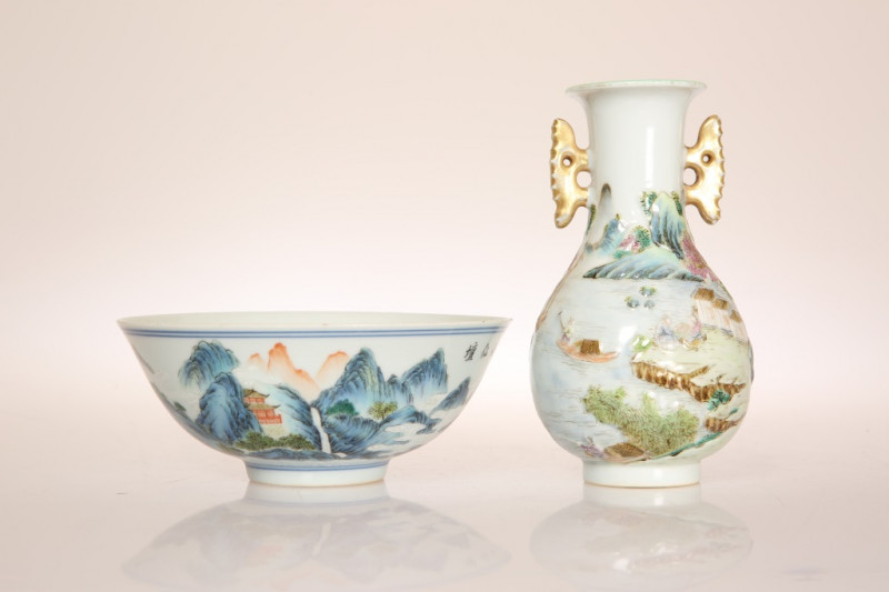 A CHINESE PORCELAIN BOWL, enamel painted in the round with a mountainous landscape and figures, 15.5cm; together with a Chinese vase, moulded and enamel painted with pavilions and figures in a landscape, 15cm. (2)
