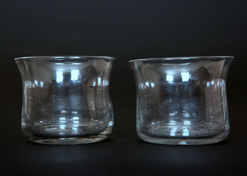 A PAIR OF GLASS BEAKERS, THIRD QUARTER 18th CENTURY, each of cylindrical form with slightly flared rim. 7.5cm by 9.25cm