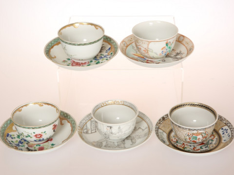 A COLLECTION OF FIVE CHINESE TEA BOWLS AND SAUCERS, comprising a pair...