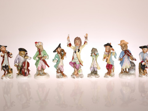 AN ASSEMBLED SET OF NINE GERMAN PORCELAIN MONKEY BAND FIGURES, late 19th...