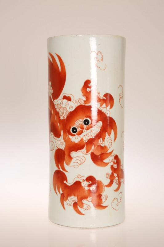 A CHINESE BLUE AND WHITE JAR, of ovoid form, 18.5cm; together with A CHINESE SLEEVE VASE, decorated with iron red, 28cm; and A CHINESE TERRACOTTA FIGURE, 25cm. (3)