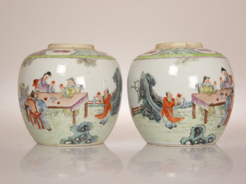 A PAIR OF CHINESE FAMILLE ROSE JARS, each enamel painted with figures...