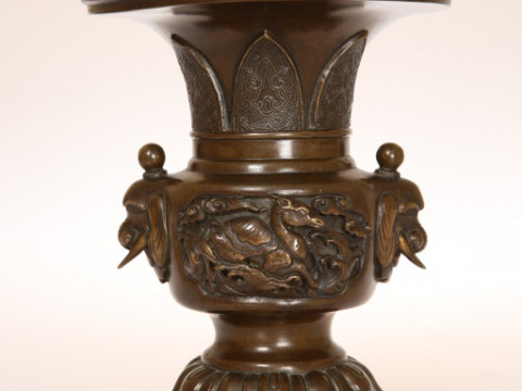 A CHINESE BRONZE VASE OF BALUSTER FORM, with everted rim, the body cast...