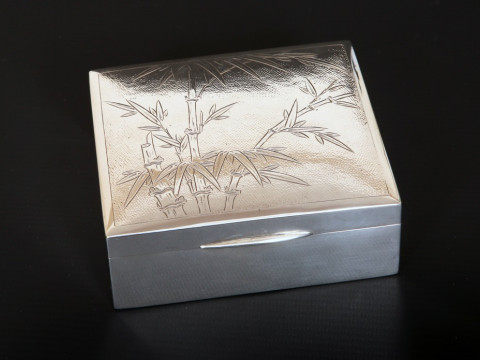 A CHINESE STERLING SILVER CIGARETTE BOX, TACKHING, HONG KONG, the hinged...