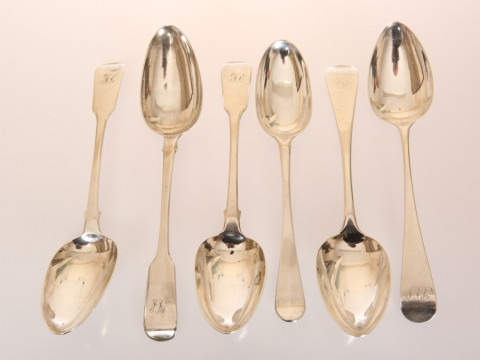 A GROUP OF SIX GEORGE III SILVER TABLE SPOONS, comprising: Old English...
