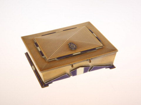 A STYLISH SILVER-GILT AND ENAMEL CIGARETTE BOX IN THE ART DECO TASTE,...