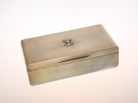 ASPREY & CO., A GEORGE V SILVER CIGARETTE BOX, London 1939, the engine...