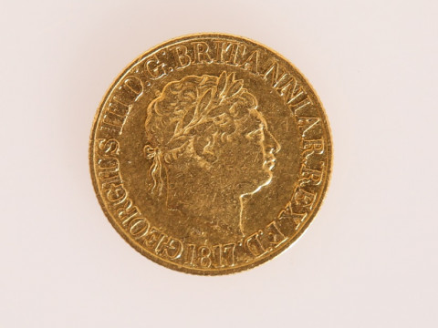 A GEORGE III FULL SOVEREIGN, 1817, with laureate head, the obverse with...